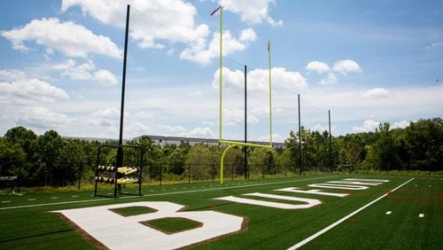 A new football field is just one of the amenities students and the community will enjoy at the new Buford High School. Students return to school on Wednesday, Aug. 7 when everyone except the littlest wolves will find themselves in new facilities. CASEY SIKES/FOR THE AJC
