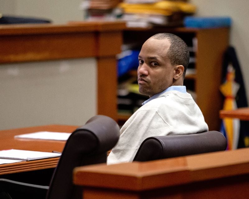 Gregory Williams looks back at the potential jurors in the DeKalb County courtroom during the jury selection portion of his trial Monday, January 13, 2020.   STEVE SCHAEFER / SPECIAL TO THE AJC