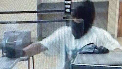 Authorities are searching for a robbery suspect who shot and critically injured a bank teller Monday in Warner Robins. (Photo courtesy of Warner Robins Police Department)