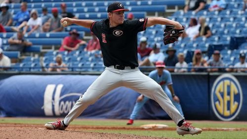 Georgia pitcher Jonathan Cannon (12) winds up to deliver a pitch during the Bulldogs' game against Ole Miss at the 2021 SEC Baseball Tournament in Hoover Metropolitan Stadium in Hoover, Ala., on Thursday, May 27, 2021. (Photo by Michael Wade/SEC)