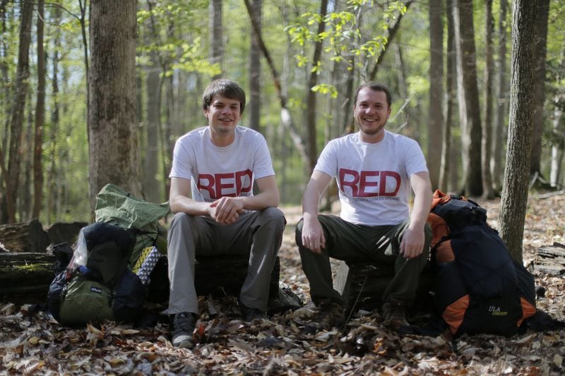 Marietta resident Kolya Schubert and Brookhaven resident Marc-Antoine Davoust will start their trek along the Pacific Crest Trail on April 11, hoping to raise awareness for the Atlanta based nonprofit RED (Rehabilitation Enables Dreams), which provides programs for young, first-time, nonviolent criminal offenders. Both were arrested as teens but broke the cycle of relapsing into criminal behavior. They’re shown hiking in Brook Run Park in Dunwoody. BOB ANDRES /BANDRES@AJC.COM
