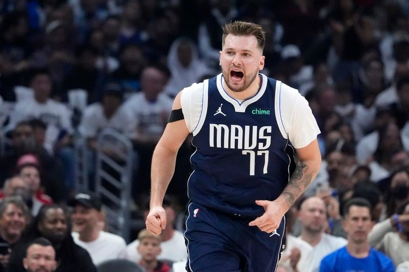 Dallas Mavericks guard Luka Doncic yells after scoring during the first half in Game 5 of an NBA basketball first-round playoff series against the Los Angeles Clippers Wednesday, May 1, 2024, in Los Angeles. (AP Photo/Mark J. Terrill)