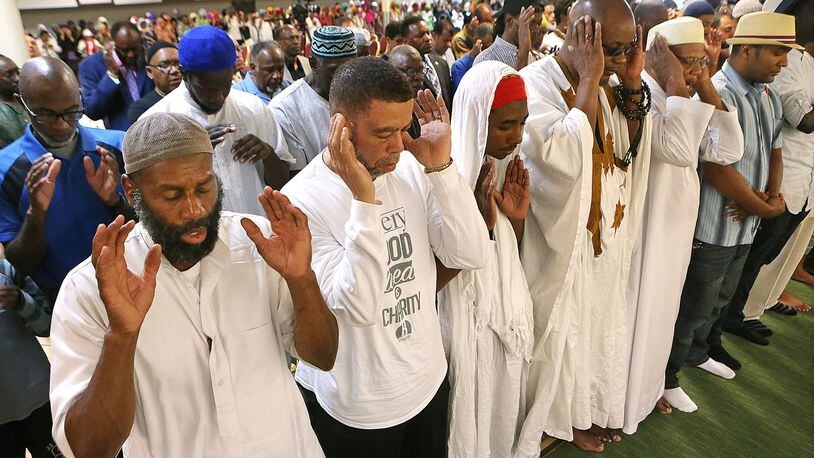 Participants join in the closing Janazah funeral prayer for Muhammad Ali at the conclusion of an interfaith memorial service at the Atlanta Masjid of Al-Islam on Thursday, June 9, 2016, in Atlanta. Curtis Compton / ccompton@ajc.com