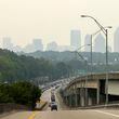 The Atlanta skyline is barely visible during poor air quality shown from the Buford connector off of I-85, Friday, June 30, 2023, in Atlanta. The Georgia Department of Natural Resources, Environmental Protection Division has issued a Code Orange Air Quality alert for Atlanta for Friday June 30th. Jason Getz / Jason.Getz@ajc.com)