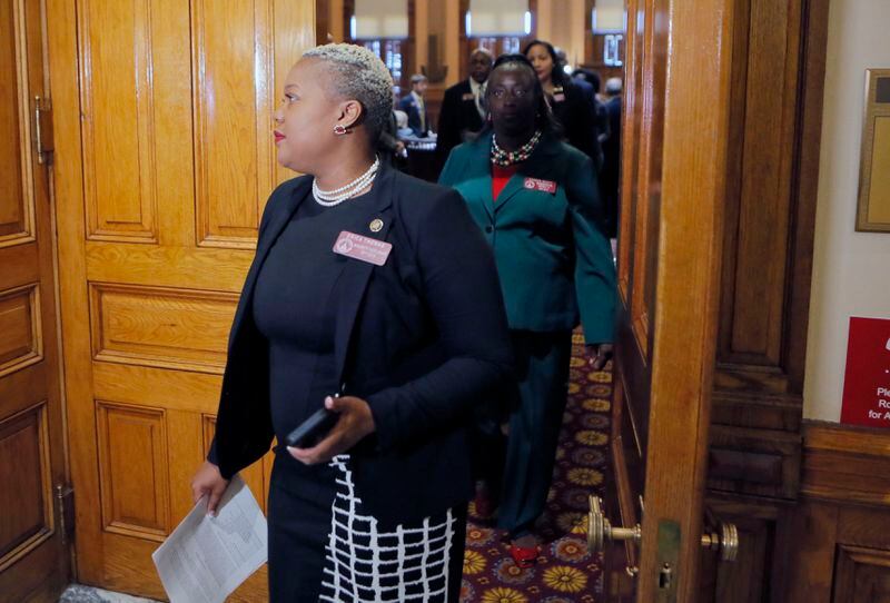 3/14/18 - Atlanta - Rep. Erica Thomas,  D - Austell, leads House Democrats out of the chamber to start their walkout.  House and Senate Democrats staged a walkout this morning in support of the school walkout in protest of gun violence.      BOB ANDRES  /BANDRES@AJC.COM
