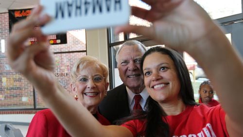Atlanta Public Schools Superintendent Meria Carstarphen takes a selfie with Gov. Nathan Deal and First Lady Sandra Deal last week. Ben Gray / bgray@ajc.com