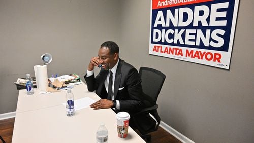 December 1, 2021 Atlanta - Mayor-elect Andre Dickens talks on the phone at his campaign headquarters on Wednesday, December 1, 2021. Andre Dickens, the Atlanta native who first beat an incumbent eight years ago for a spot on the City Council, defeated Felicia Moore in TuesdayÕs runoff election to become AtlantaÕs 61st mayor. (Hyosub Shin / Hyosub.Shin@ajc.com)