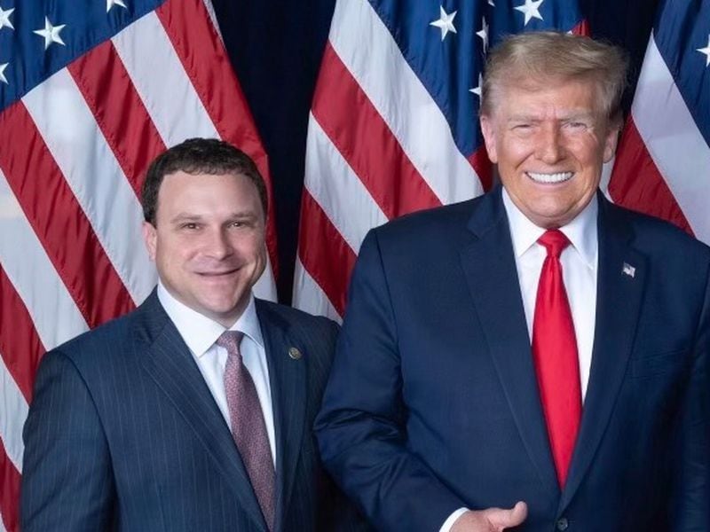 Georgia Agriculture Commissioner Tyler Harper (left) attended Donald Trump's primary victory party at the former president's Mar-a-Lago club in Florida on Tuesday. 