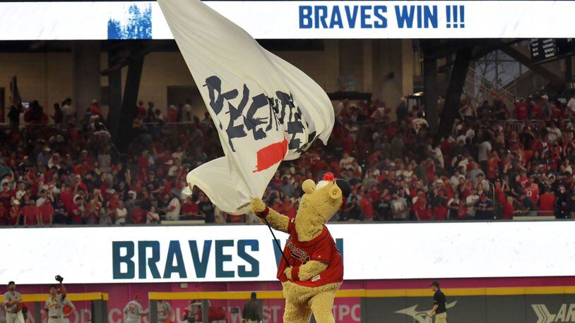 Braves mascot Blooper waves a flag after Atlanta Braves won over the St. Louis Cardinals during Game 2 of best-of-five National League Division Series at SunTrust Park on Friday, October 4, 2019.