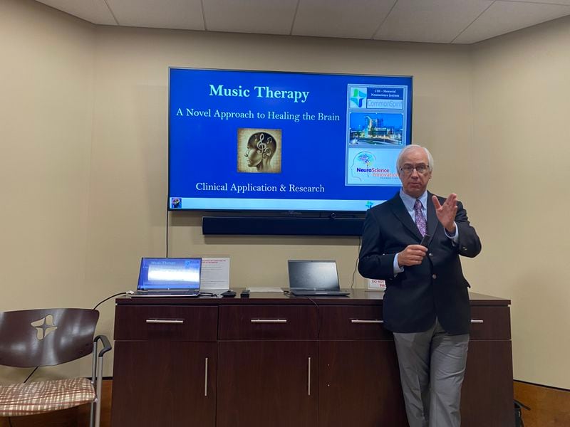 Dr. Thomas Devlin, a neurologist and medical director at CHI Memorial Stroke and Neuroscience Center, talks about music therapy at a media event at CHI Memorial Hospital on Monday. (Photo Courtesy of Elizabeth Fite)