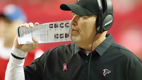 Keep going for it on fourth down, Dan Quinn. But how about making it next time? (AP Photo/John Bazemore)