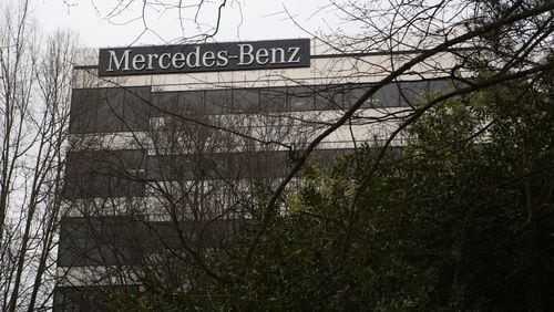 The logo at the top of the Mercedes-Benz USA corporate office building peaks through the branches of surrounding trees in Atlanta on March 13. Mercedes-Benz is one of the many large companies that benefits from multi-million-dollar tax breaks awarded by quasi-governmental agencies. Development authorities in development authorities in Cobb, DeKalb, Fulton and Gwinnett counties and the city of Atlanta have awarded about $500 million in tax incentives over the last three years, according to an analysis by The Atlanta Journal-Constitution. (HENRY TAYLOR / HENRY.TAYLOR@AJC.COM)