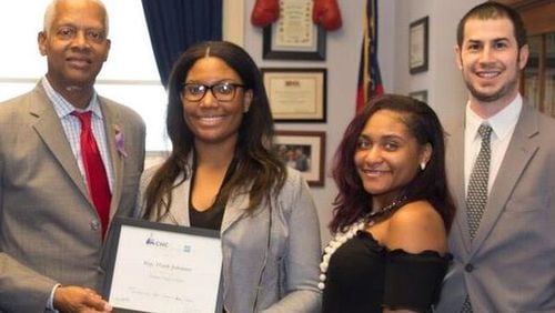 U.S. Rep. Hank Johnson of Georgia (left) meets with Redan High School students Shania Hinds and Alexis Goings and their teacher William Roth during a recent visit to Washington, D.C. The students’ school is in Johnson’s district. CONTRIBUTED