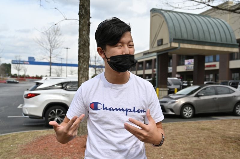 Peter Cheng, a 17-year-old student visiting from California, says the spa shootings were a part of a larger problem of violent crimes against the Asian community since the start of the pandemic. “Historically, Asians never had support from any side of the political party. ...  In the future, I think Asian Americans need to start standing up.” (Hyosub Shin / Hyosub.Shin@ajc.com)