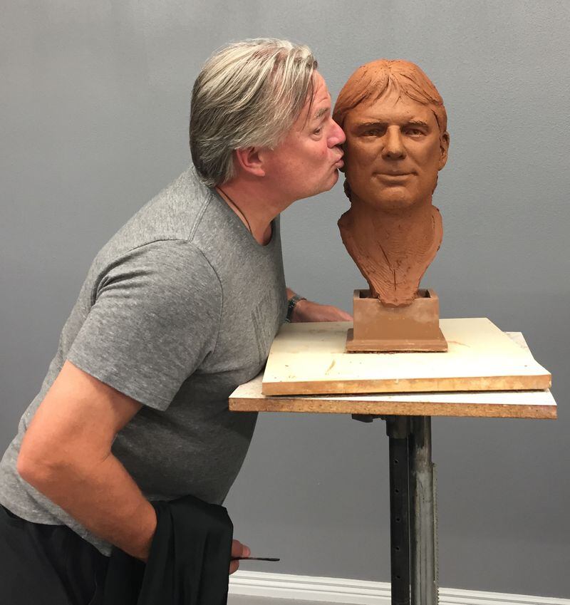 Morten Andersen with his bust. (Courtesy of Pro Football Hall of Fame)