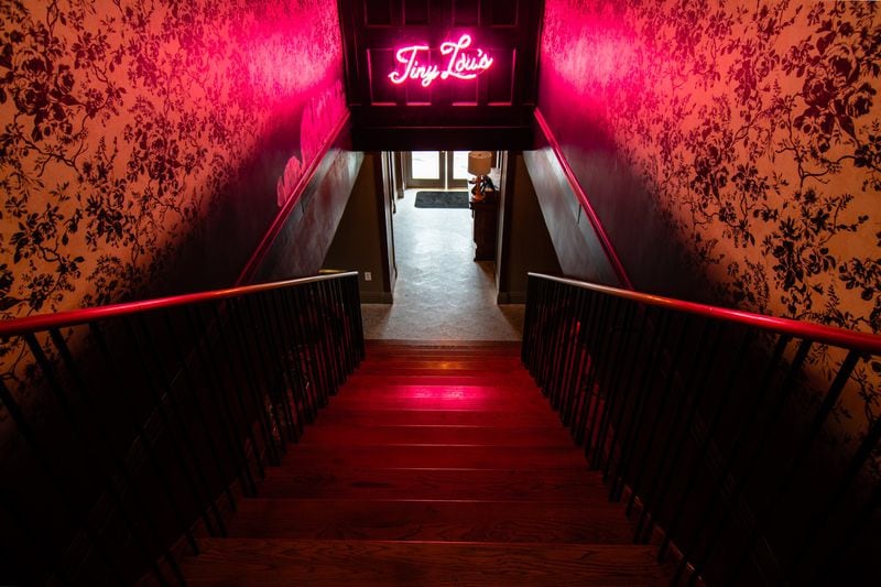 The staircase at Tiny Lou’s has quickly become one of Atlanta’s most Instagrammable locations. CONTRIBUTED BY HENRI HOLLIS