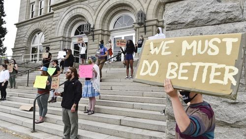 Protesters gather on the steps of the City-County Building in Helena, Mont. Friday, May 29, 2020 in solidarity with nationwide protests over the killing of George Floyd by Minneapolis police officers on May 25. (Thom Bridge/Independent Record via AP)