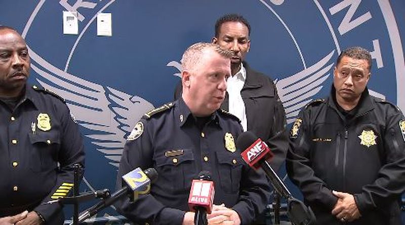 Atlanta Police Chief Darin Schierbaum speaks at a news conference along with Mayor Andre Dickens (back center) after protesters against a police training center turned violent Saturday, Jan. 21, 2023. (Photo: Channel 2 Action News)