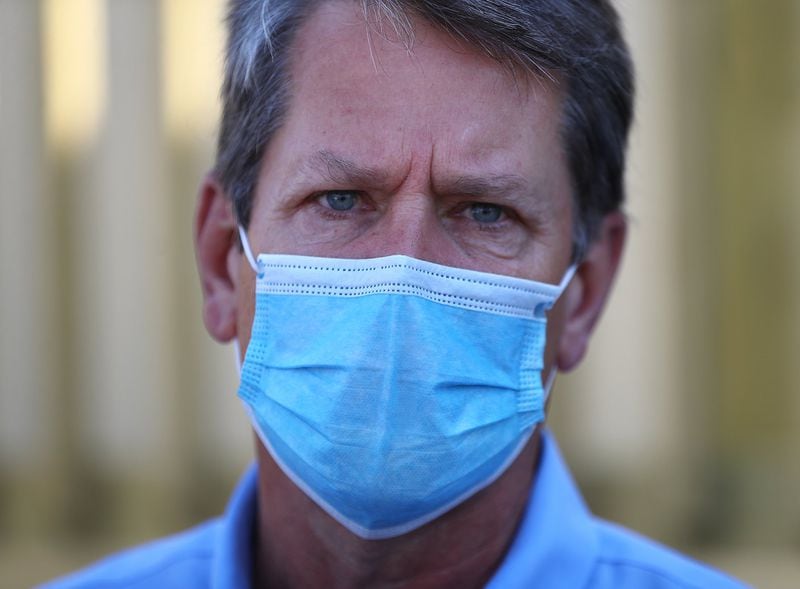 Gov. Brian Kemp wore a mask and urged all Georgians to do the same after touring a temporary medical pod for non-critical COVID-19 patients at the North Campus of Phoebe Putney Health System on May 5, 2020, in Albany. (CURTIS COMPTON / ccompton@ajc.com)