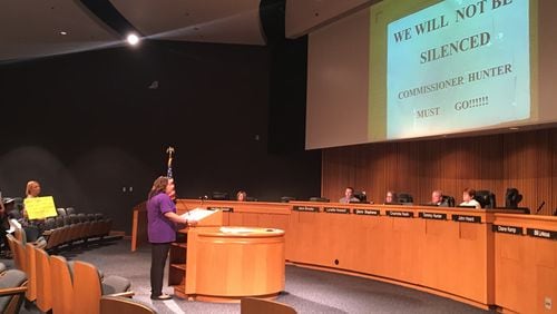 Protester Phyllis Richardson addresses the Gwinnett County Board of Commissioners on Tuesday, April 18, 2017.