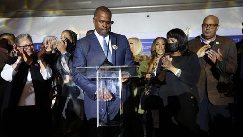 Atlanta mayoral candidate Kasim Reed turned down after finishing his speech during the election night celebration at the Hyatt Regency. on Tuesday, Nov. 2, 2021.
Miguel Martinez for The Atlanta Journal-Constitution