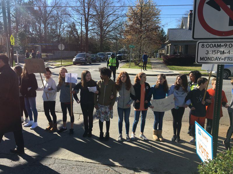 Students participate in the student walkout at Inman Middle School in Atlanta on March 14, 2018.