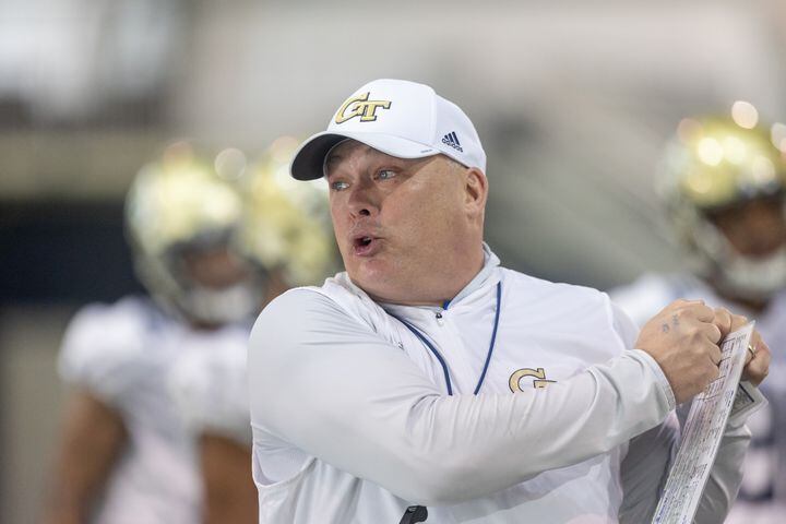 Head coach Geoff Collins talks with players during the first day of spring practice for Georgia Tech football at Alexander Rose Bowl Field in Atlanta, GA., on Thursday, February 24, 2022. (Photo Jenn Finch)