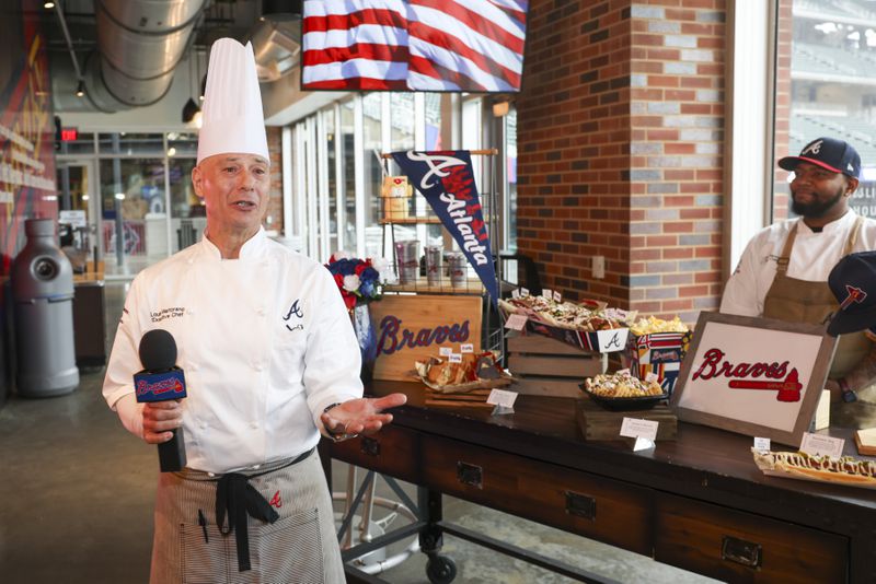 Executive chef Louis Martorano discusses the specialty food items during media day at Truist Park, Tuesday, March 26, 2024, in Atlanta. (Jason Getz / jason.getz@ajc.com)