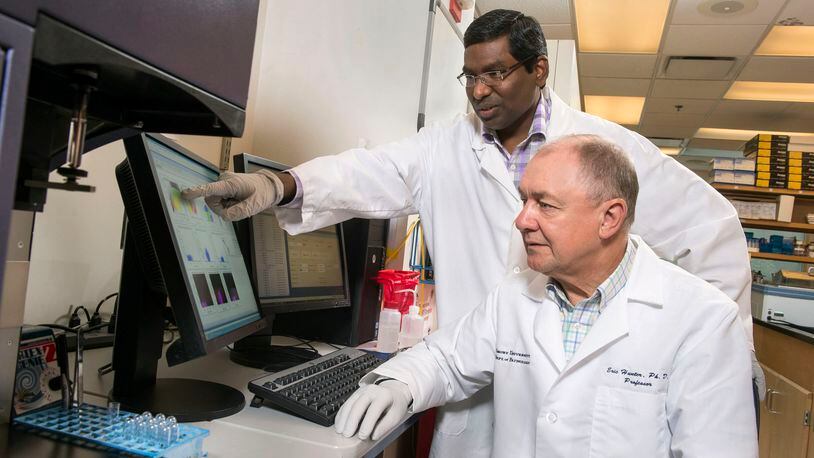 Pictured are the two co-principal investigators of the NIH grant awarded to Emory for HIV/AIDS research: Dr. Rama Amara (left) Dr. Eric Hunter (right).