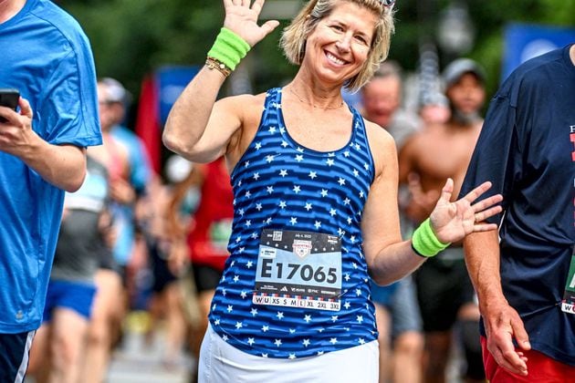 Metro Atlanta Chamber president and CEO Katie Kirkpatrick runs the Peachtree Road Race.