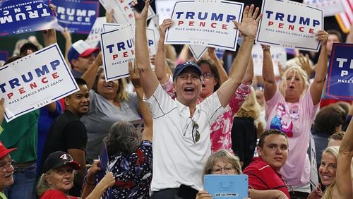 Supporters yell during a campaign rally for Republican presidential candidate Donald Trump in Kissimmee, Fla., on Thursday. Stephen M. Dowell/Orlando Sentinel/TNS