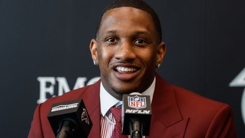 The Falcons' first-round pick, quarterback Michael Penix Jr., speaks during an introductory press conference in Flowery Branch on Friday, April 26, 2024. (Natrice Miller/ AJC)
