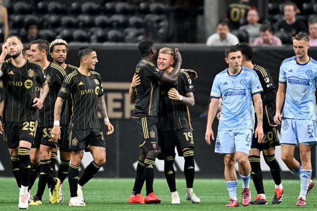 Los Angeles FC midfielder Mateusz Bogusz (19) celebrates with teammates after scoring during the second half in a MLS soccer match at Mercedes-Benz Stadium, Saturday, May 25, 2024, in Atlanta. Los Angeles FC won 1-0 over Atlanta United. (Hyosub Shin / AJC)