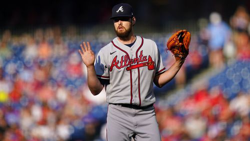 Atlanta Braves starting pitcher Ian Anderson reacts after giving up a single to Philadelphia Phillies' Nick Castellanos during the first inning of a baseball game, Thursday, June 30, 2022, in Philadelphia. (AP Photo/Matt Slocum)