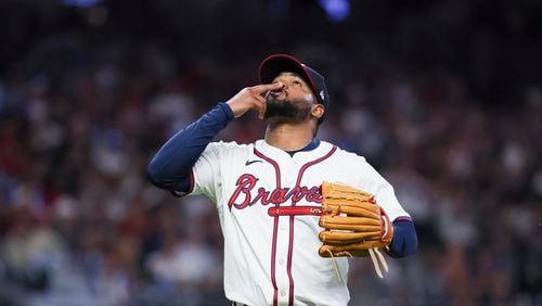 Atlanta Braves starting pitcher Reynaldo Lopez reacts after Miami Marlins shortstop Tim Anderson (not pictured) flied out to end the top of the seventh inning at Truist Park, Wednesday, April 24, 2024, in Atlanta. The Braves won 4-3 in the 10th inning. (Jason Getz / AJC)