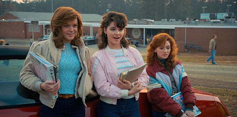  Metro Atlanta actress Madelyn Cline (center) plays Tina and Abigail Cowen (left) plays Vicki in "Stranger Things 2" lusting over arrival Billy Hargrove.