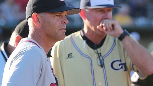 Georgia head baseball coach Scott Stricklin and Georgia Tech head baseball coach Danny Hall meet at home as they prepare to play each other in a NCAA college baseball game on Tuesday, April 25, 2017, at Russ Chandler Stadium in Atlanta.
