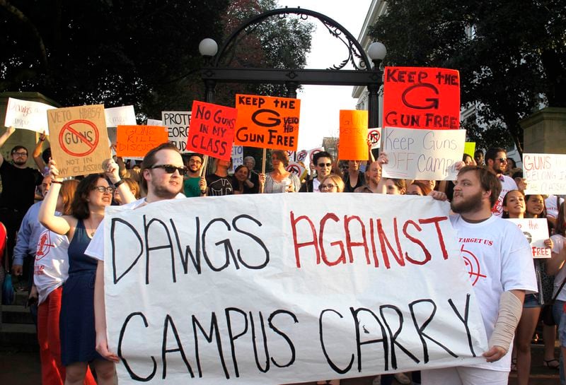 Protesters rallied last year against the campus carry bill at the University of Georgia. TAYLOR.CARPENTER@AJC.COM