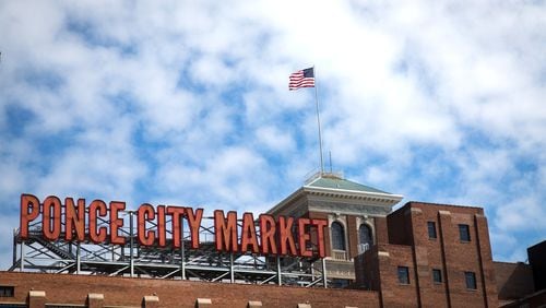 The American flag flys over the renovated Ponce City Market, a popular development near the Atlanta Beltline. STEVE SCHAEFER / SPECIAL TO THE AJC