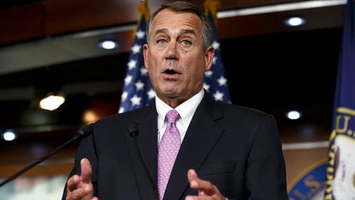 FILE - In this Feb. 6, 2014 file photo, House Speaker John Boehner of Ohio speaks during a news conference on Capitol Hill in Washington. In a concession to President Barack Obama and Democratic lawmakers, Boehner said Tuesday the House will vote to increase the government's borrowing cap without trying to attach conditions sought by some Republicans. "We'll let his party give him the debt ceiling increase that he wants," Boehner said, hours before the expected evening vote. (AP Photo/J. Scott Applewhite, File) House Speaker John Boehner of Ohio speaks during a 2014 news conference on Capitol Hill