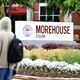 A student walks by a Morehouse College sign in Atlanta on April 24, 2024. (Miguel Martinez/AJC)