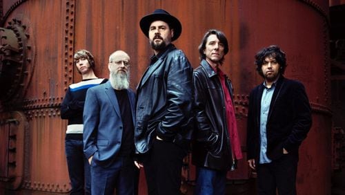 The Drive-By Truckers — Matt Patton (from left), Brad Morgan, Patterson Hood, Mike Cooley and Jay Gonzalez — is the subject of a new biography, "Where the Devil Don't Stay," by Stephen Deusner.  CONTRIBUTED BY DANNY CLINCH