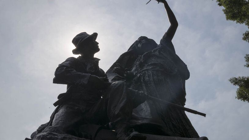 The “Peace Monument” in Atlanta’s Piedmont Park depicts an angel staying the hand of a Confederate soldier as he holds a rifle. In her other hand, the angel holds an olive branch.