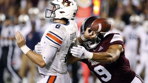 FILE - In this Oct. 6, 2018, file photo, Mississippi State defensive end Montez Sweat (9) forces Auburn quarterback Jarrett Stidham (8) to fumble as he attempts to pass during the second half of an NCAA college football game, in Starkville, Miss. A main reason Mississippi State is allowing fewer than 13 points per game is a defensive front anchored by end Montez Sweat and tackle Jeffery Simmons. Sweat has 18 sacks in 19 career games. Mississippi State plays at LSU on Saturday, Oct. 20. (AP Photo/Rogelio V. Solis)