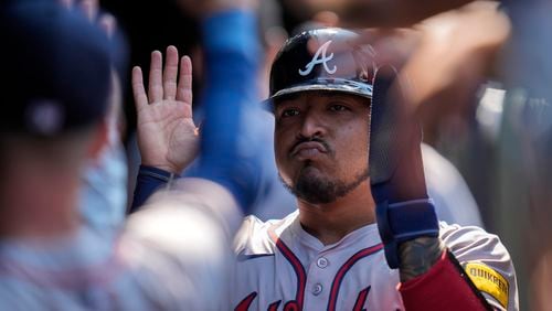 Atlanta Braves' Chadwick Tromp celebrates after scoring on a single from Ozzie Albies during the eighth inning of a baseball game against the Chicago Cubs, Thursday, May 23, 2024, in Chicago. (AP Photo/Erin Hooley)
