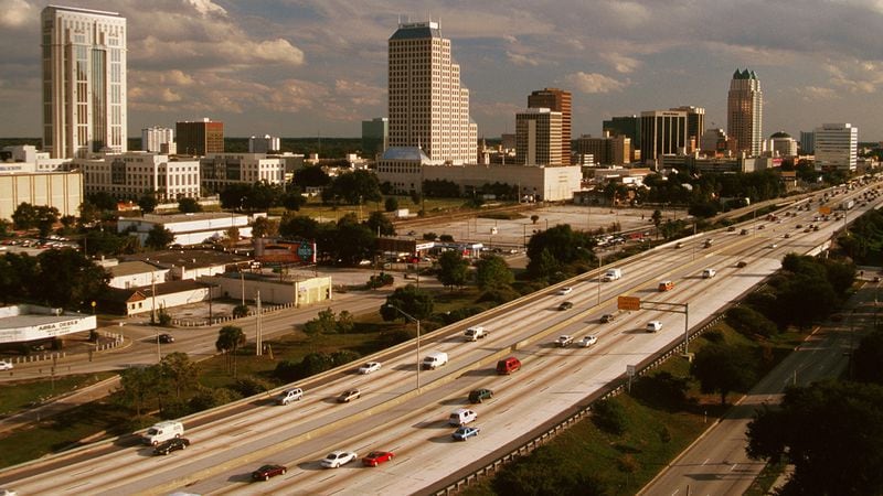 Florida, Orlando, City Skyline And Traffic On Interstate 4. (Photo by: Jeff Greenberg/UIG via Getty Images)