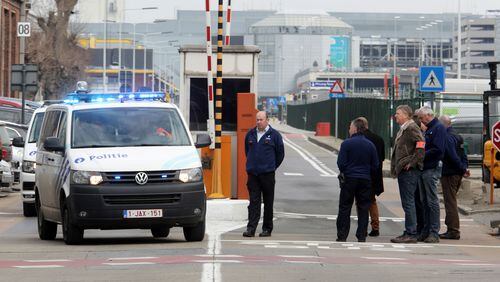BRUSSELS, BELGIUM - MARCH 22: Police vehicles leave Zaventem Bruxelles International Airport after a terrorist attack on March 22, 2016 in Brussels, Belgium. At least 34 people are thought to have been killed after Brussels airport and a Metro station were targeted by explosions. The attacks come just days after a key suspect in the Paris attacks, Salah Abdeslam, was captured in Brussels(Photo by Sylvain Lefevre/Getty Images)