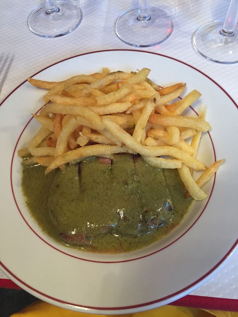 The Paris restaurant Le Relais de l’Entrecôte has a set menu: steak-frites and secret sauce. All you have to do is tell them how you want the meat cooked. (Courtesy of Olivia King)