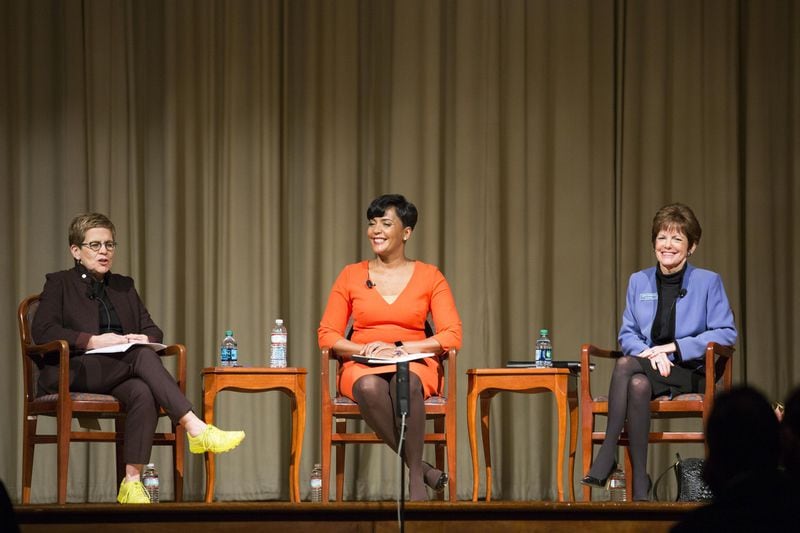 Atlanta mayoral candidates Keisha Lance Bottoms (center) and Mary Norwood (right) participate in a forum moderated by former Atlanta City Council President Cathy Woolard (left) at the Carter Center on Tuesday, November 28, 2017. 