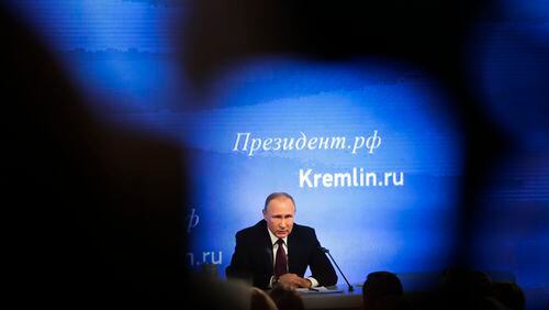 Russian President Vladimir Putin speaks during his annual news conference in Moscow, Russia, Friday, Dec. 23, 2016. Putin says U.S. Democrats should have apologized to American voters over the information revealed by hackers who posted Democratic National Committee e-mails. (AP Photo/Pavel Golovkin)
